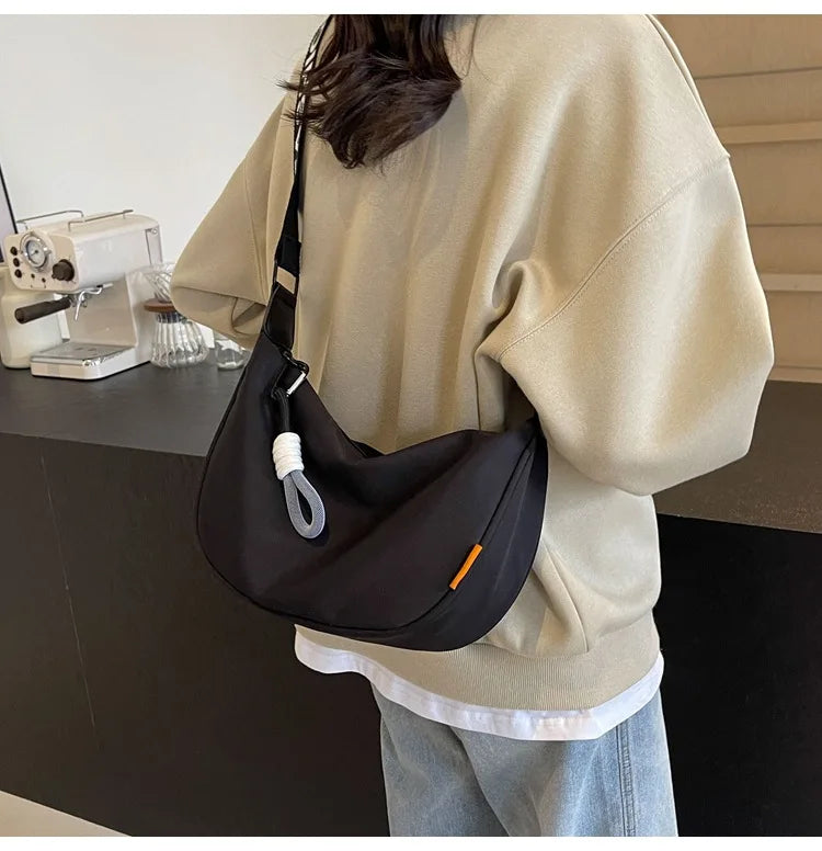 2026 New Fashion Crossbody Bag Simple Wide Shoulder Strap Design Single Shoulder Bag Original Style Commuting Dumpling Women Bag