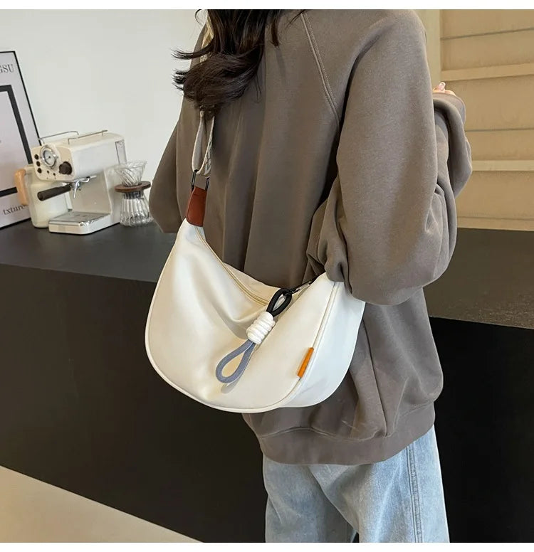 2026 New Fashion Crossbody Bag Simple Wide Shoulder Strap Design Single Shoulder Bag Original Style Commuting Dumpling Women Bag